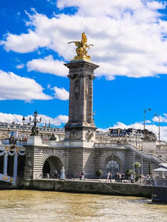 Socles crowned by gilded Fames sculptures - Pont Alexandre III - Bridge over the Seine, France