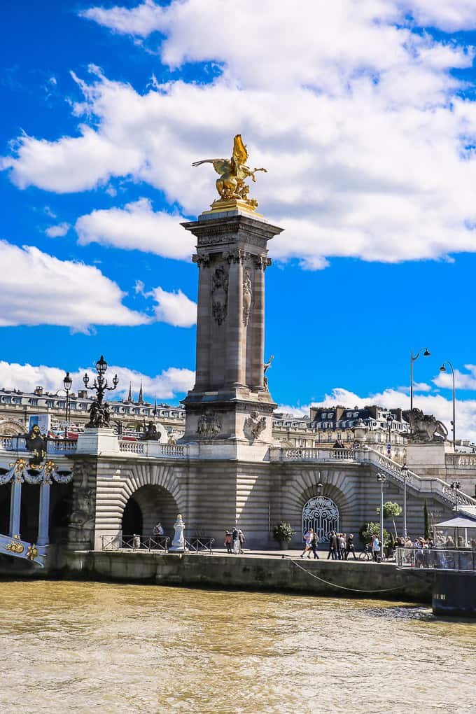 Socles crowned by gilded Fames sculptures - Pont Alexandre III - Bridge over the Seine, France