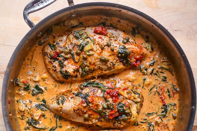 Creamy Tuscan Chicken with Sun-Dried Tomatoes, Spinach, Artichokes, and Capers