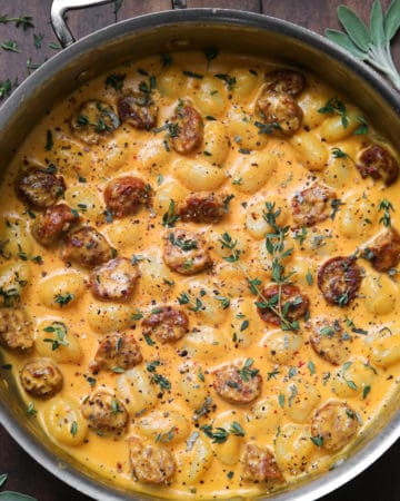 Creamy Butternut Squash Gnocchi with Sausage in a stainless steel pan