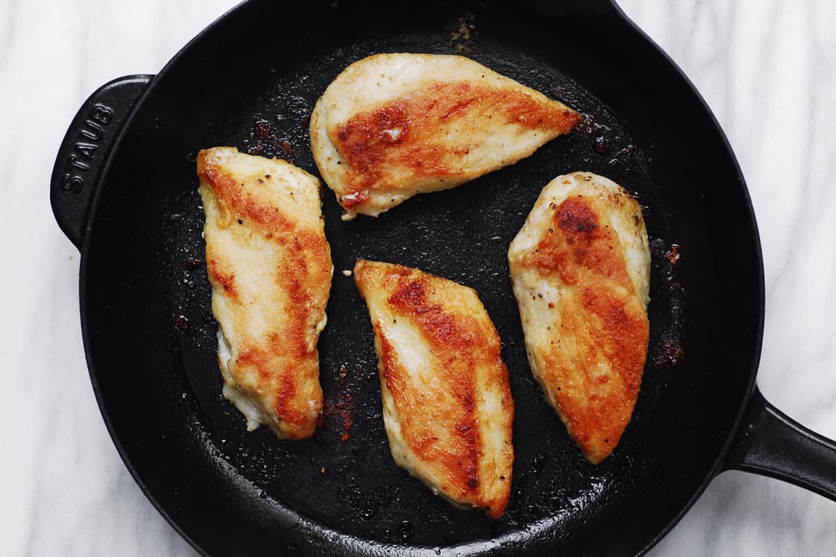 seared chicken in a cast-iron skillet