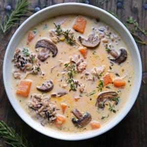 Creamy Chicken and Wild Rice Soup with Mushrooms in a white bowl