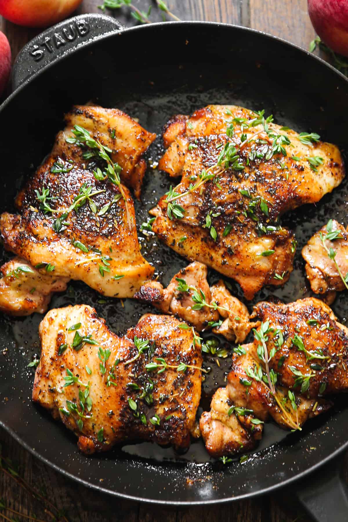 Cooked Boneless Skinless Chicken Thighs in a cast iron skillet