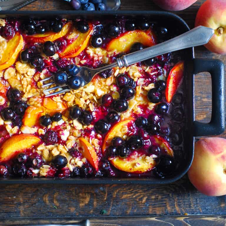 blueberry peach crisp in a baking dish