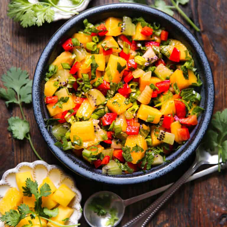 mango salsa in a blue bowl