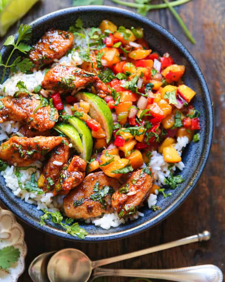 Cilantro-Lime Chicken Bowls with Peach Salsa and Rice - in a blue bowl