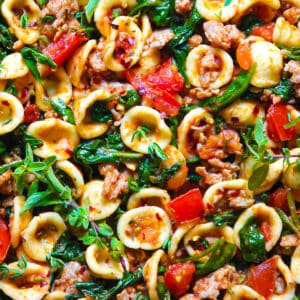 Sausage Orecchiette with Spinach and Tomatoes - close-up.