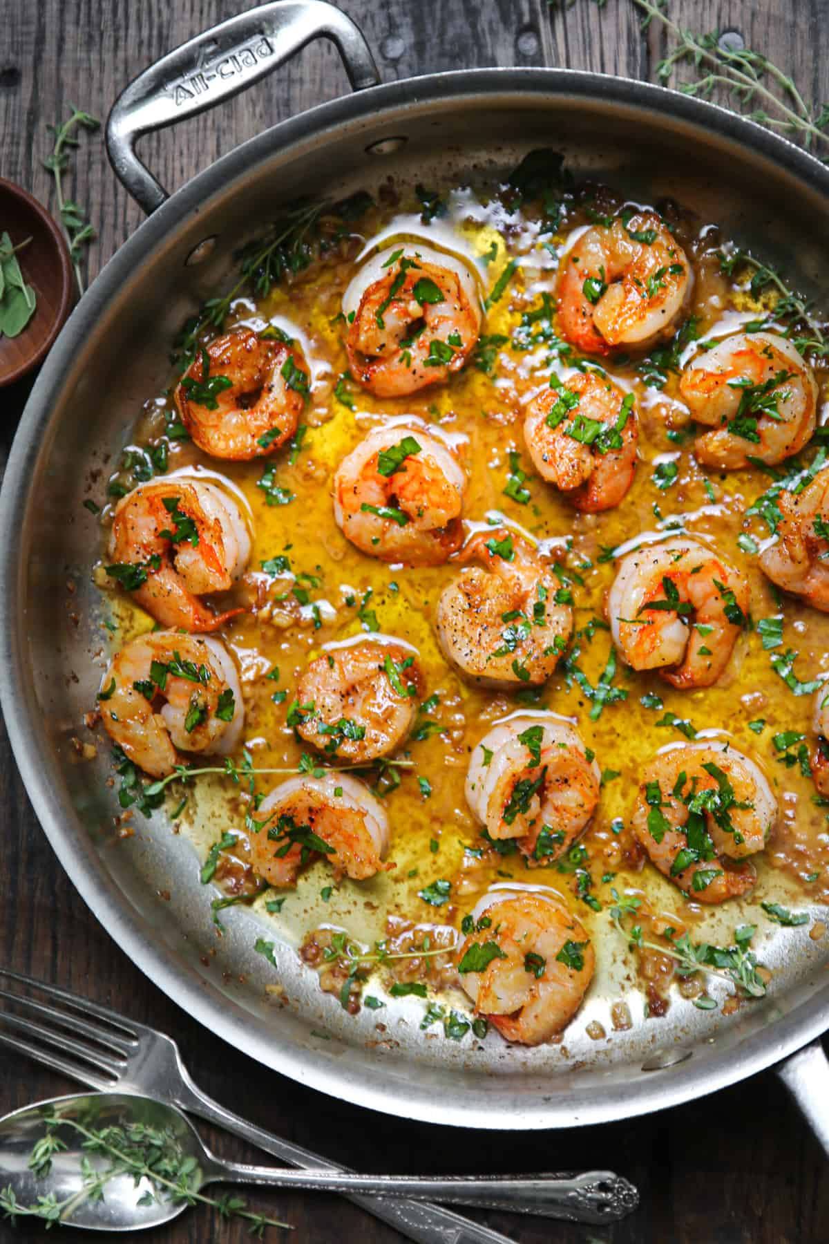 Garlic Butter Shrimp in a stainless steel pan.
