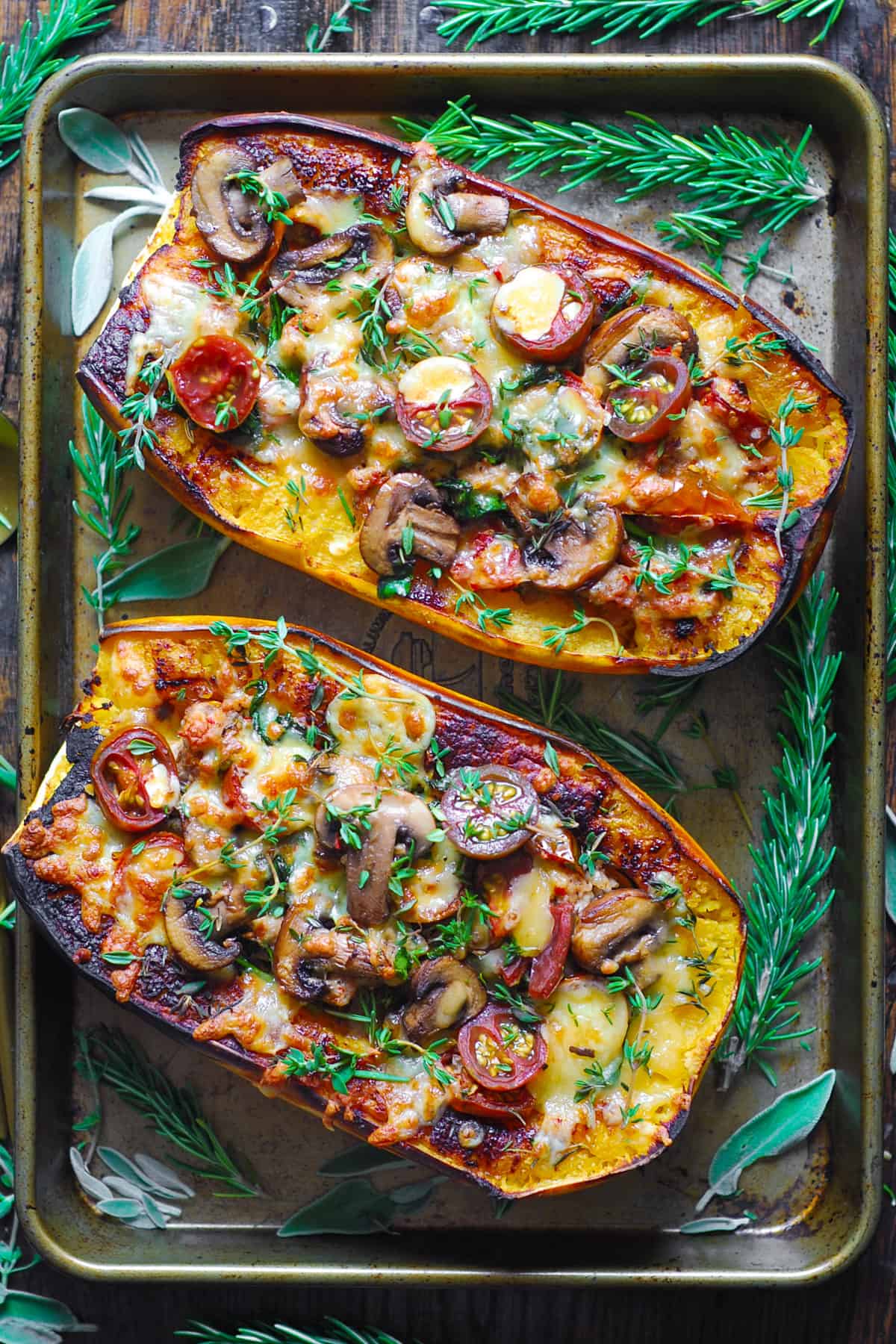 Sausage Stuffed Spaghetti Squash with Spinach, Tomatoes, Mushrooms, and Parmesan