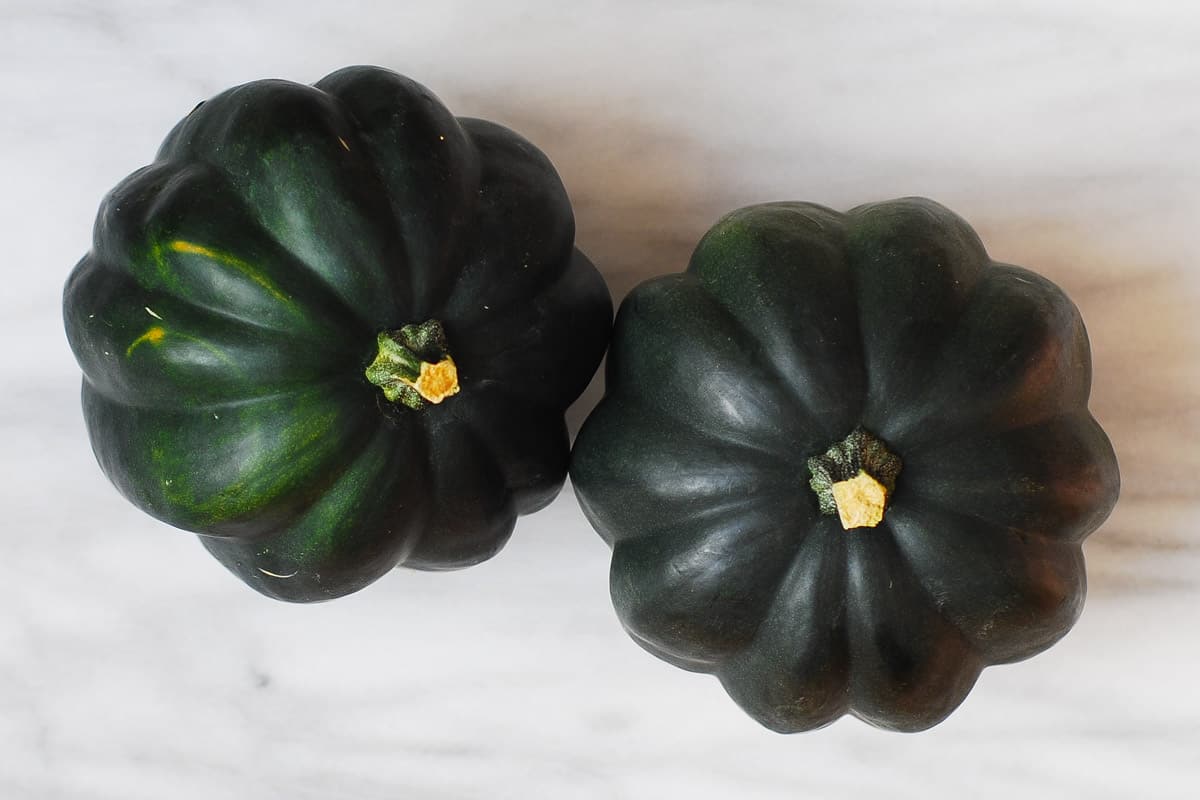 two acorn squashes