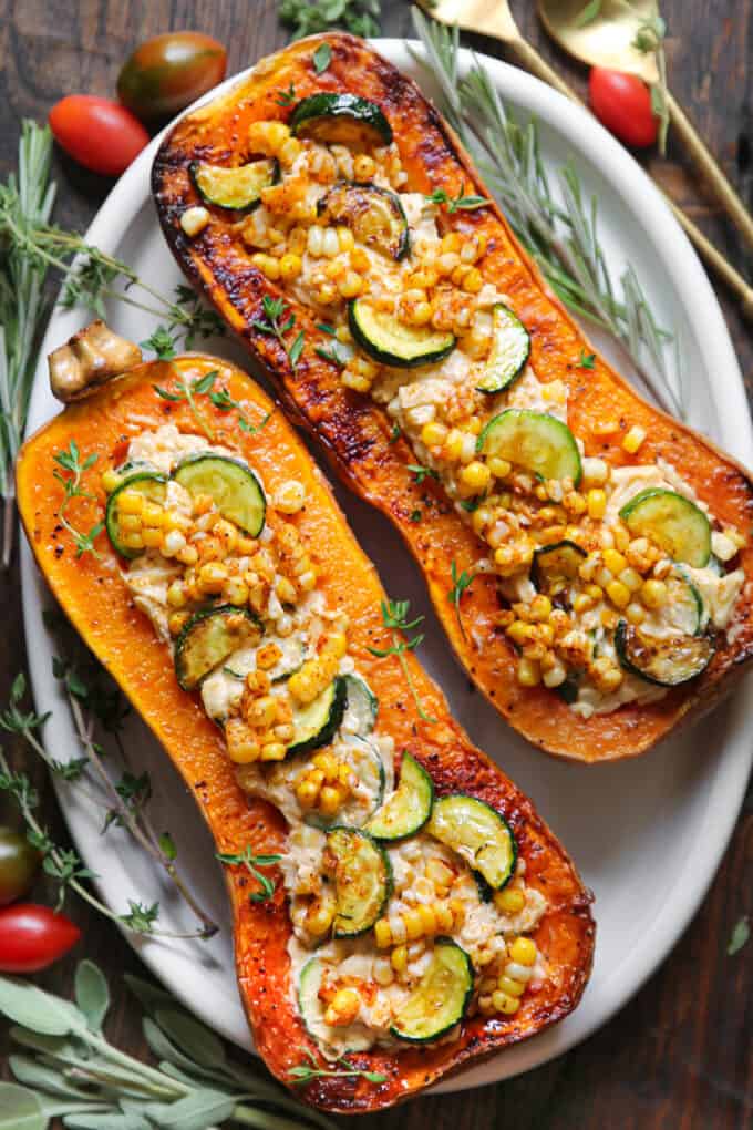 Roasted Butternut Squash stuffed with Corn, Zucchini, and Cheese ...