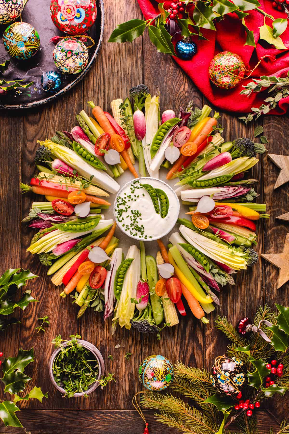 Thanksgiving veggie tray (in the shape of wreath) with Sour Cream and Chive Dip in the middle of the wreath.