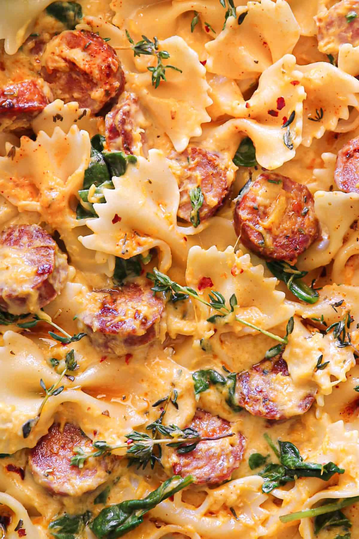 Creamy Acorn Squash Pasta with Sausage and Spinach - close-up photo.