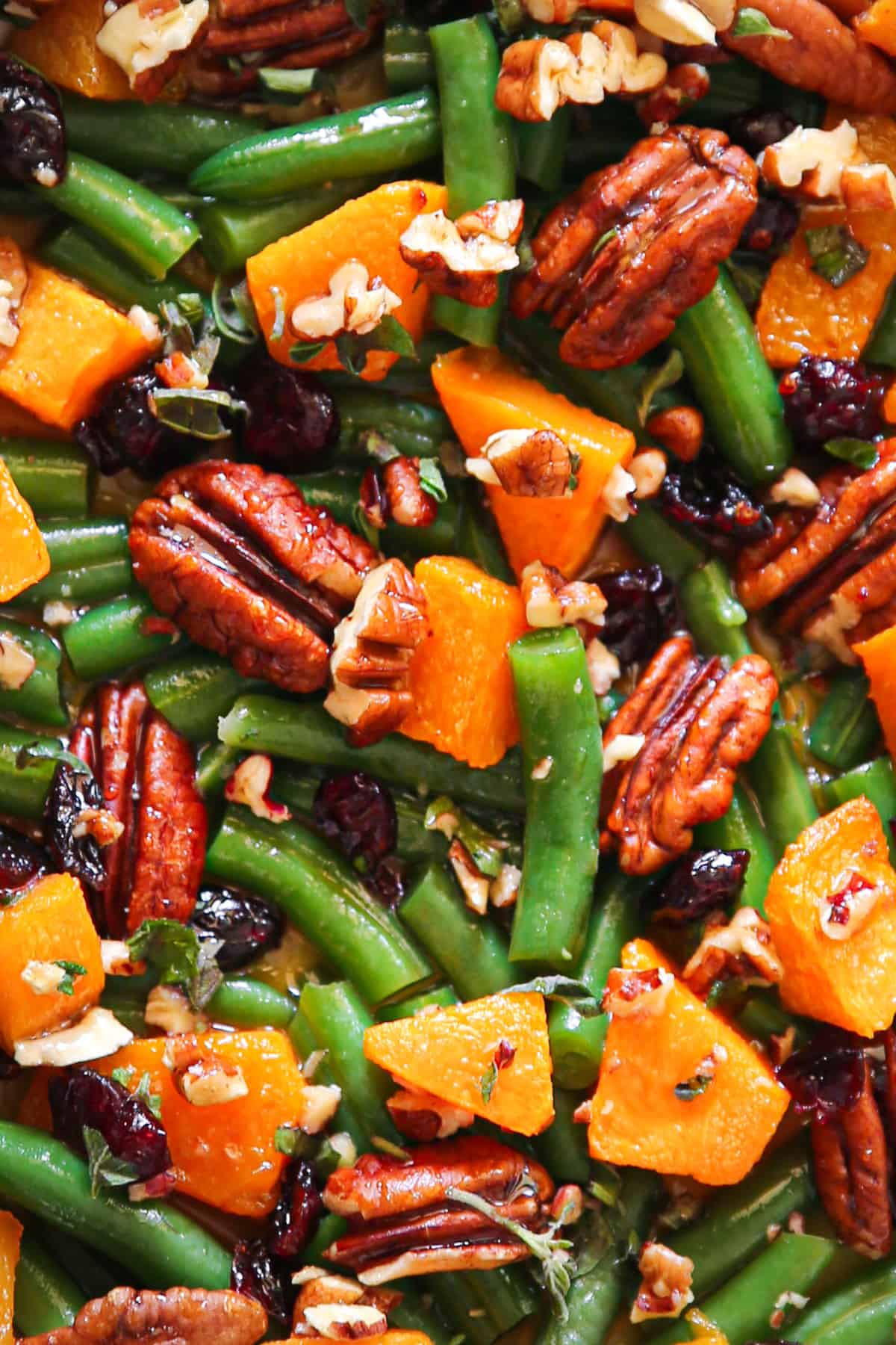 Thanksgiving Green Beans with Butternut Squash, Pecans, and Cranberries - close-up photo.