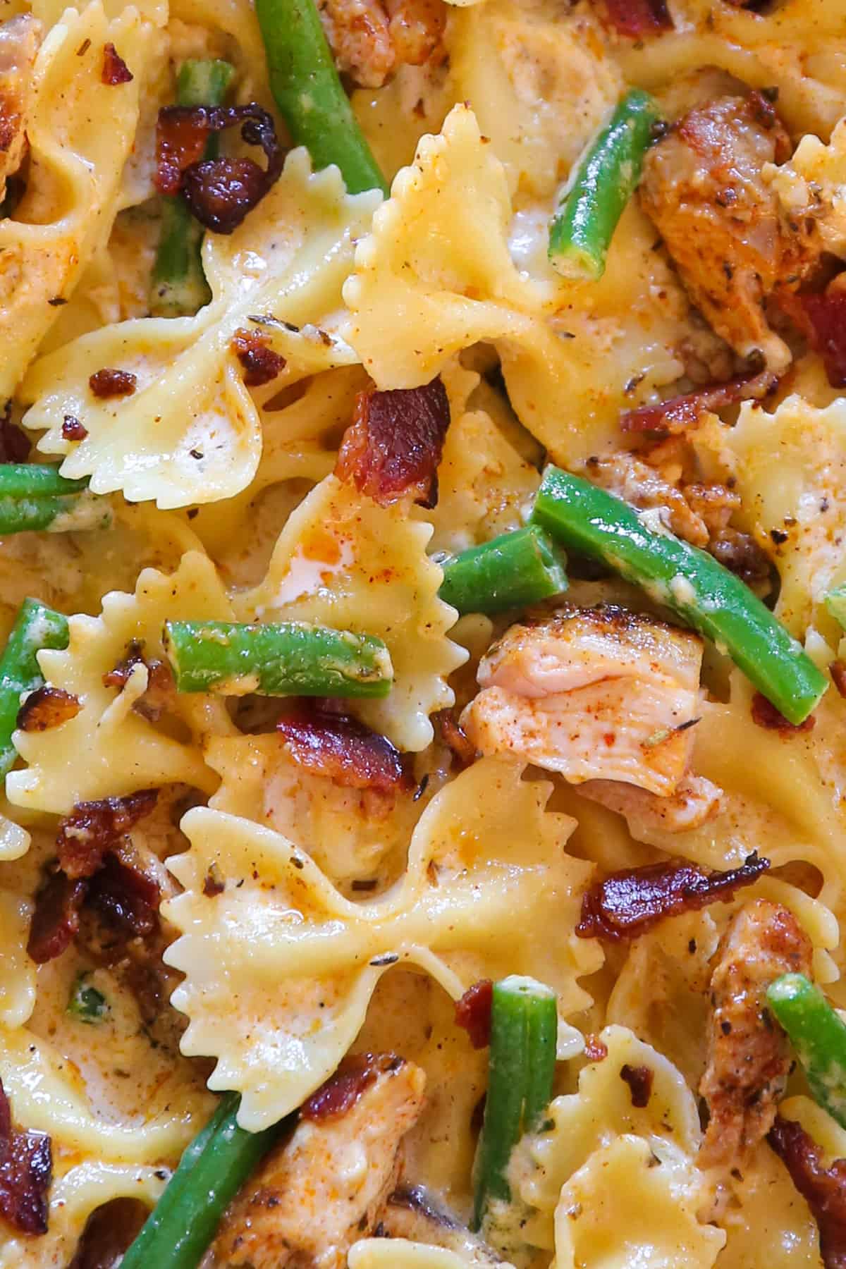 Creamy Chicken Pasta with Green Beans and Bacon - close-up photo.