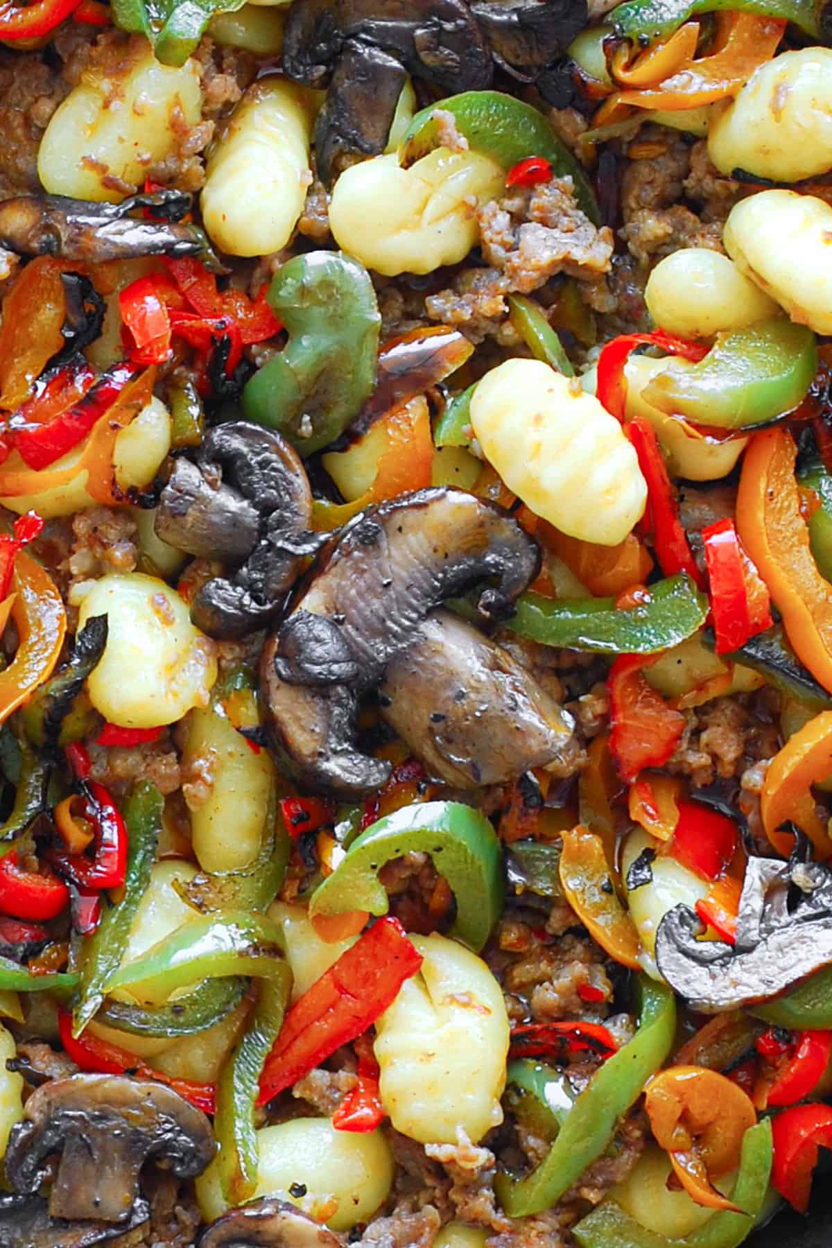 Spicy Italian Sausage Gnocchi with Mushrooms and Bell Peppers - close-up photo.
