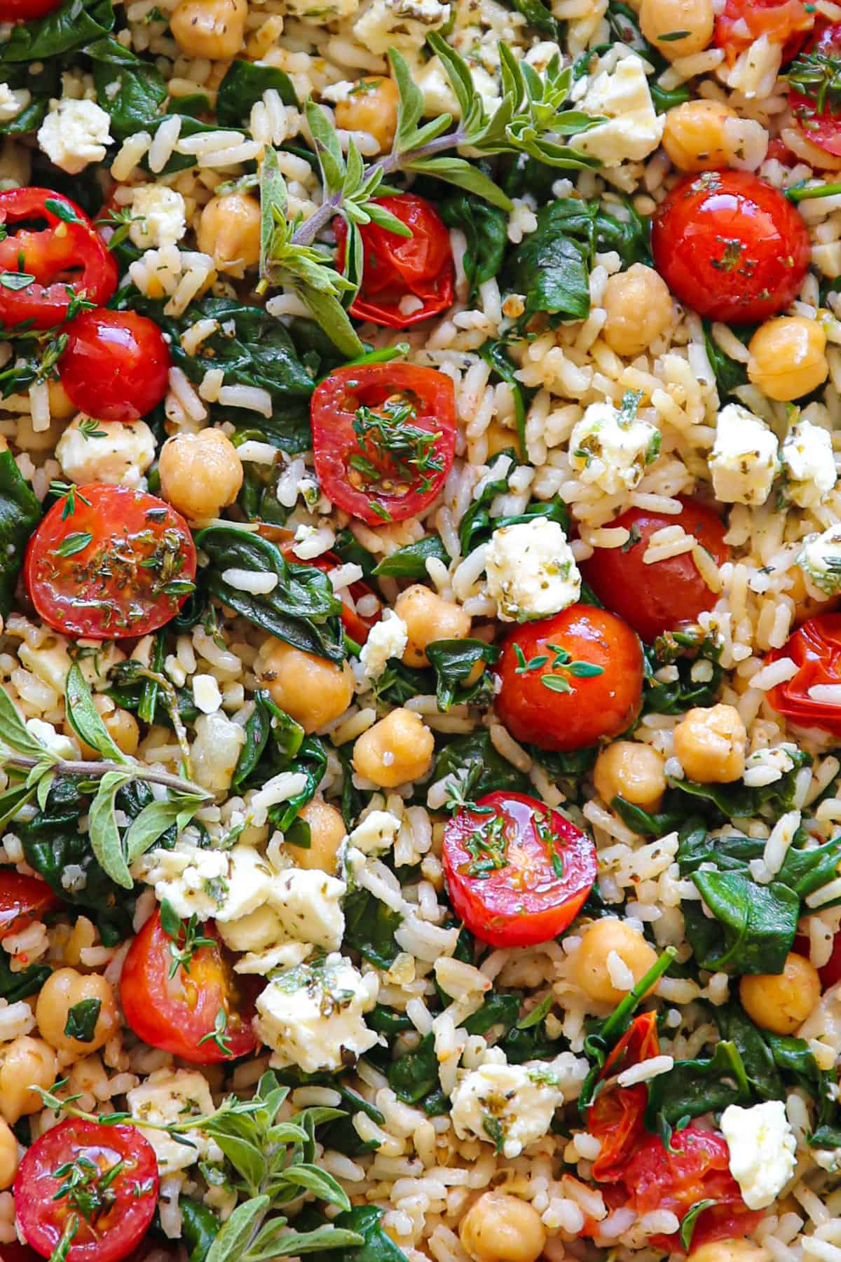 Mediterranean Lemon Rice with Chickpeas, Tomatoes, and Feta - close-up photo.