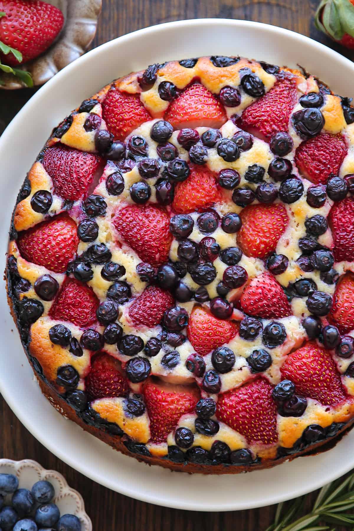 Strawberry Blueberry Cake - on a white platter.