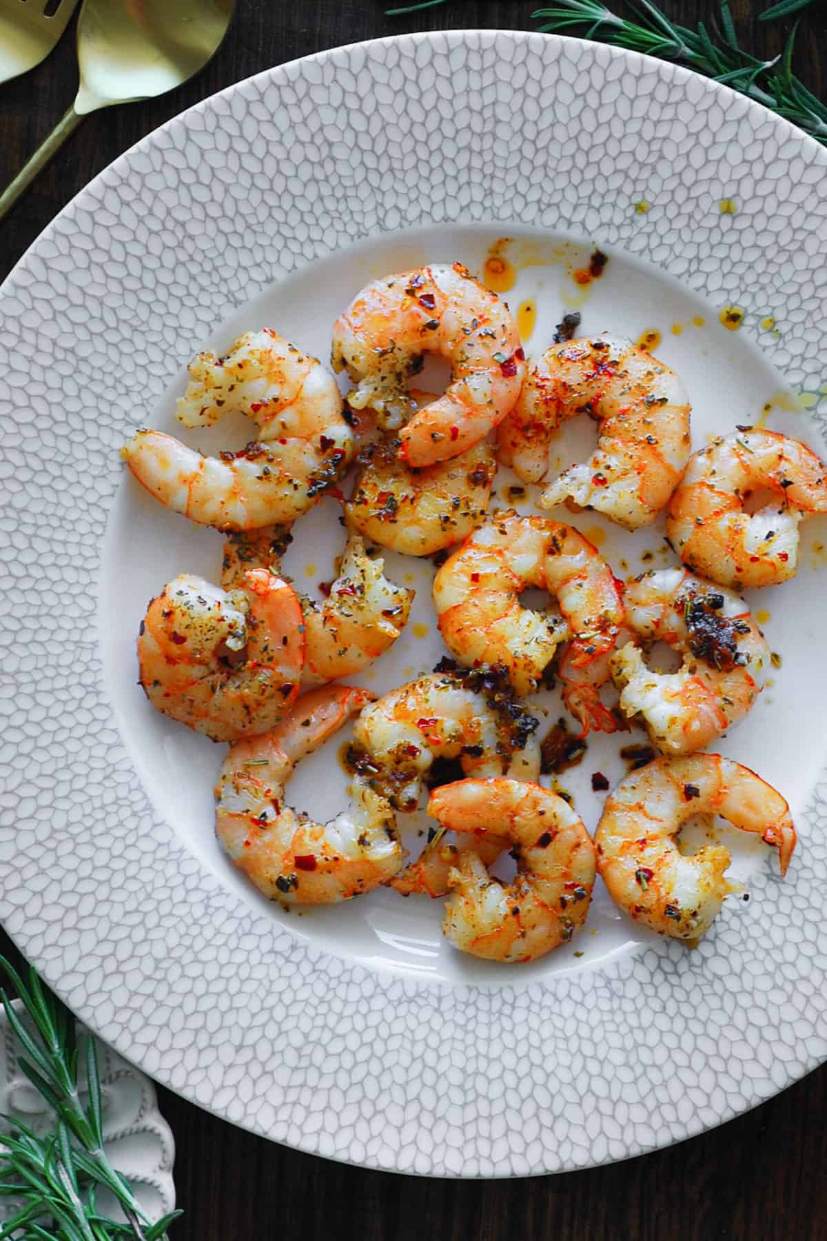 cooked shrimp on a white plate.