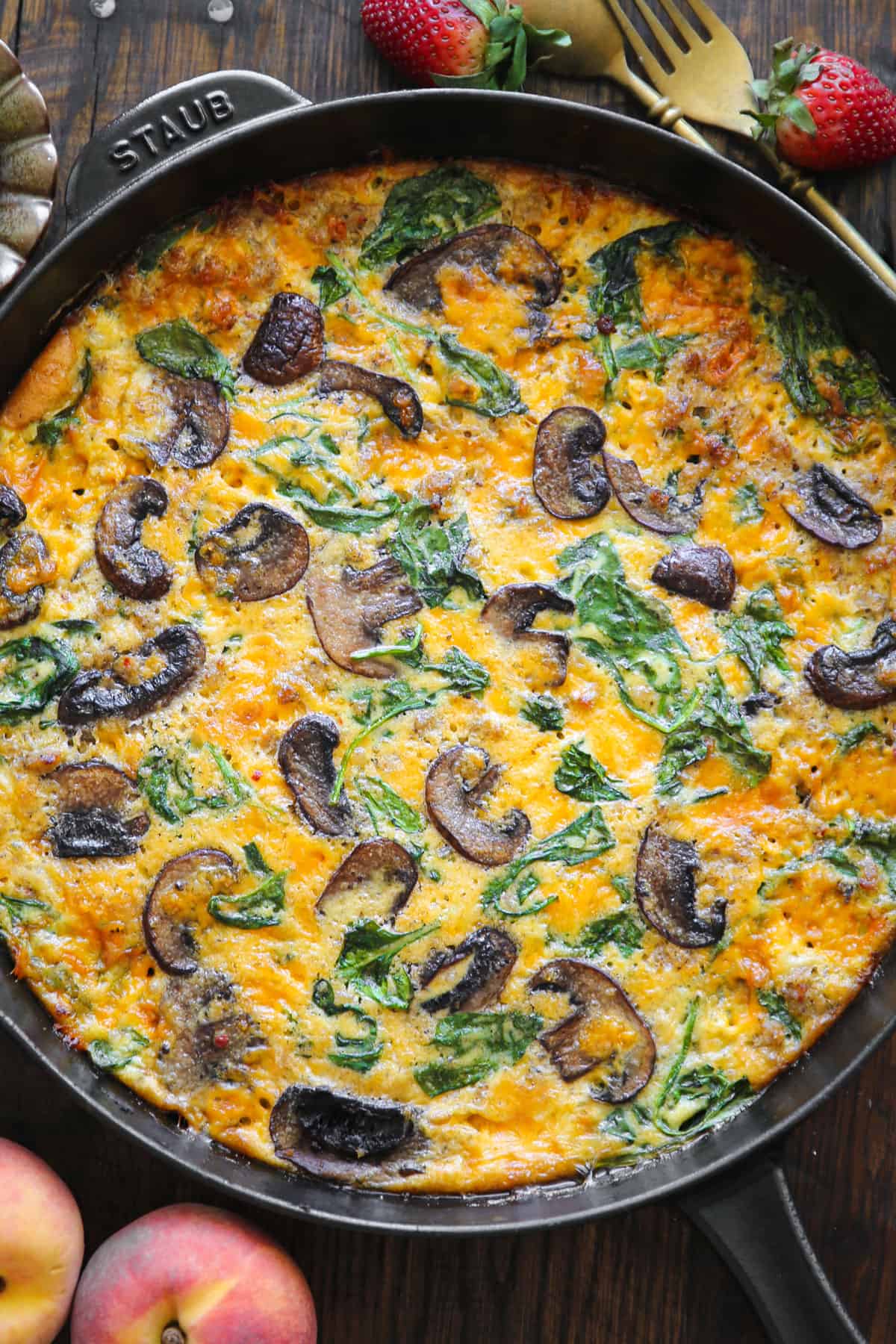Sausage Frittata with Spinach and Mushrooms - in a cast iron skillet.