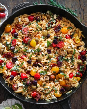 Greek Orzo with Tomatoes and Feta - in a cast iron skillet.