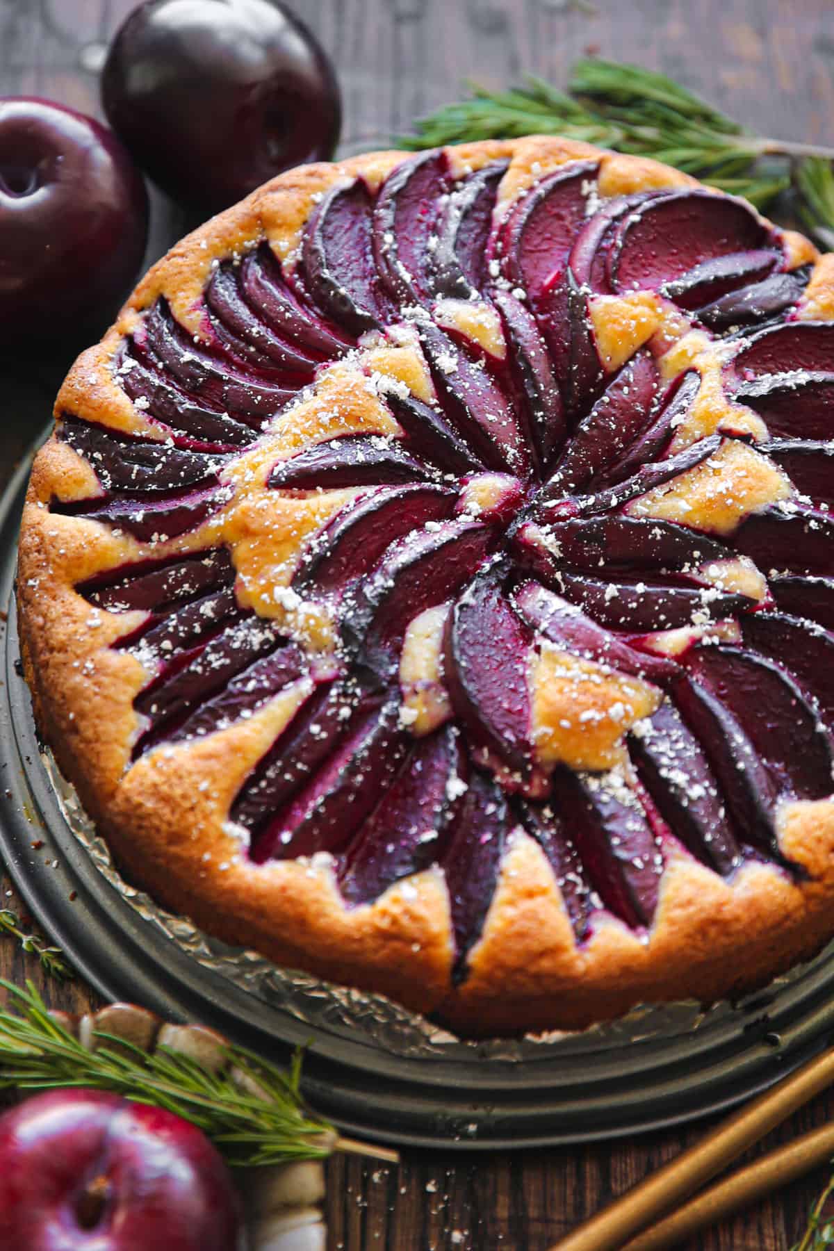 Plum Cake dusted with powdered sugar.
