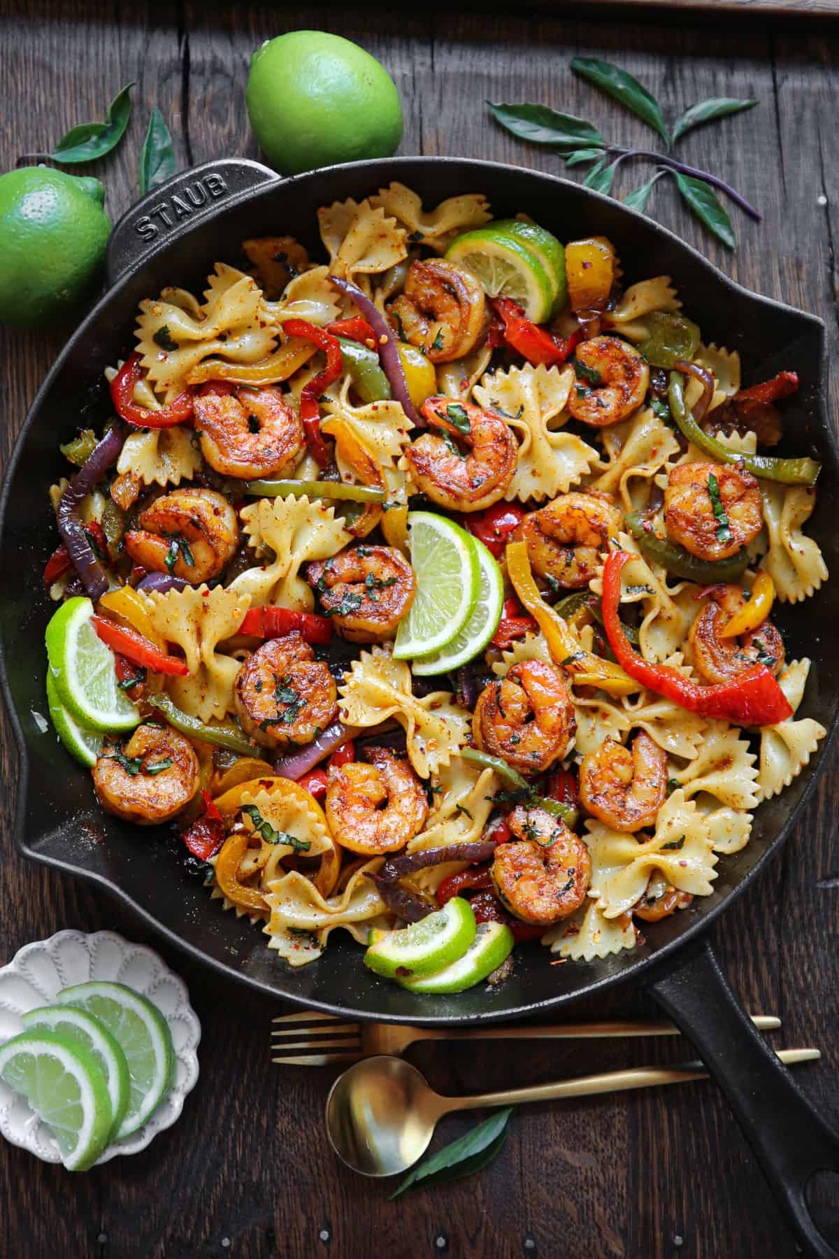 Shrimp Pasta with Bell Peppers and Red Onions (fajita-style) - in a cast iron skillet.