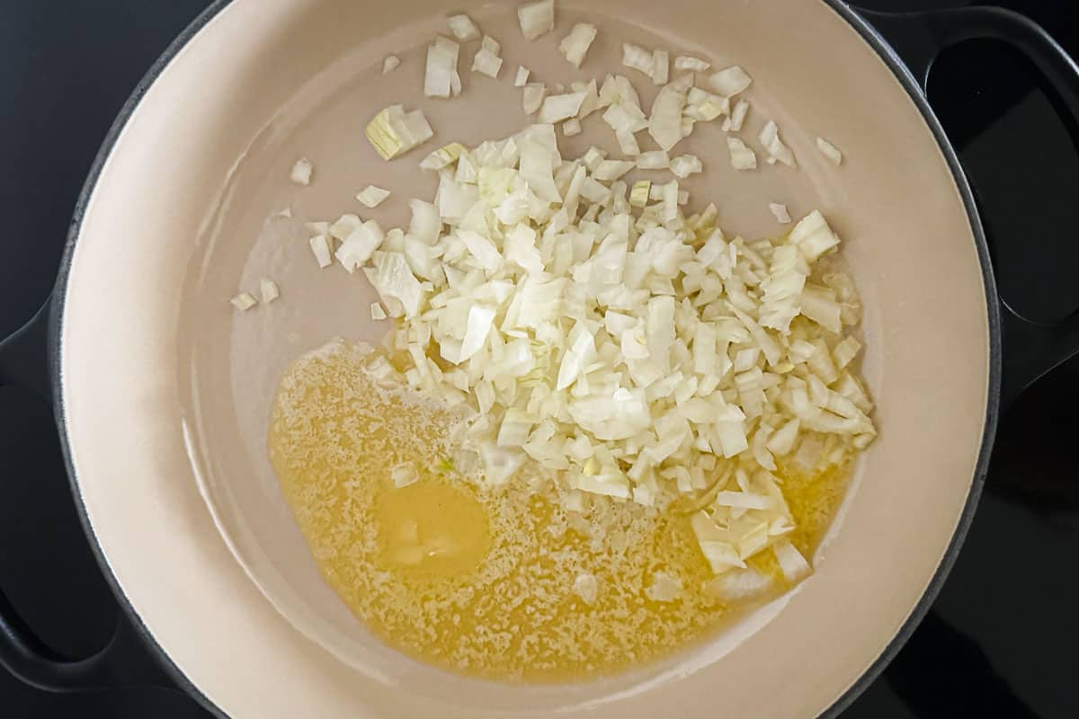melted butter with chopped onion in a pan.