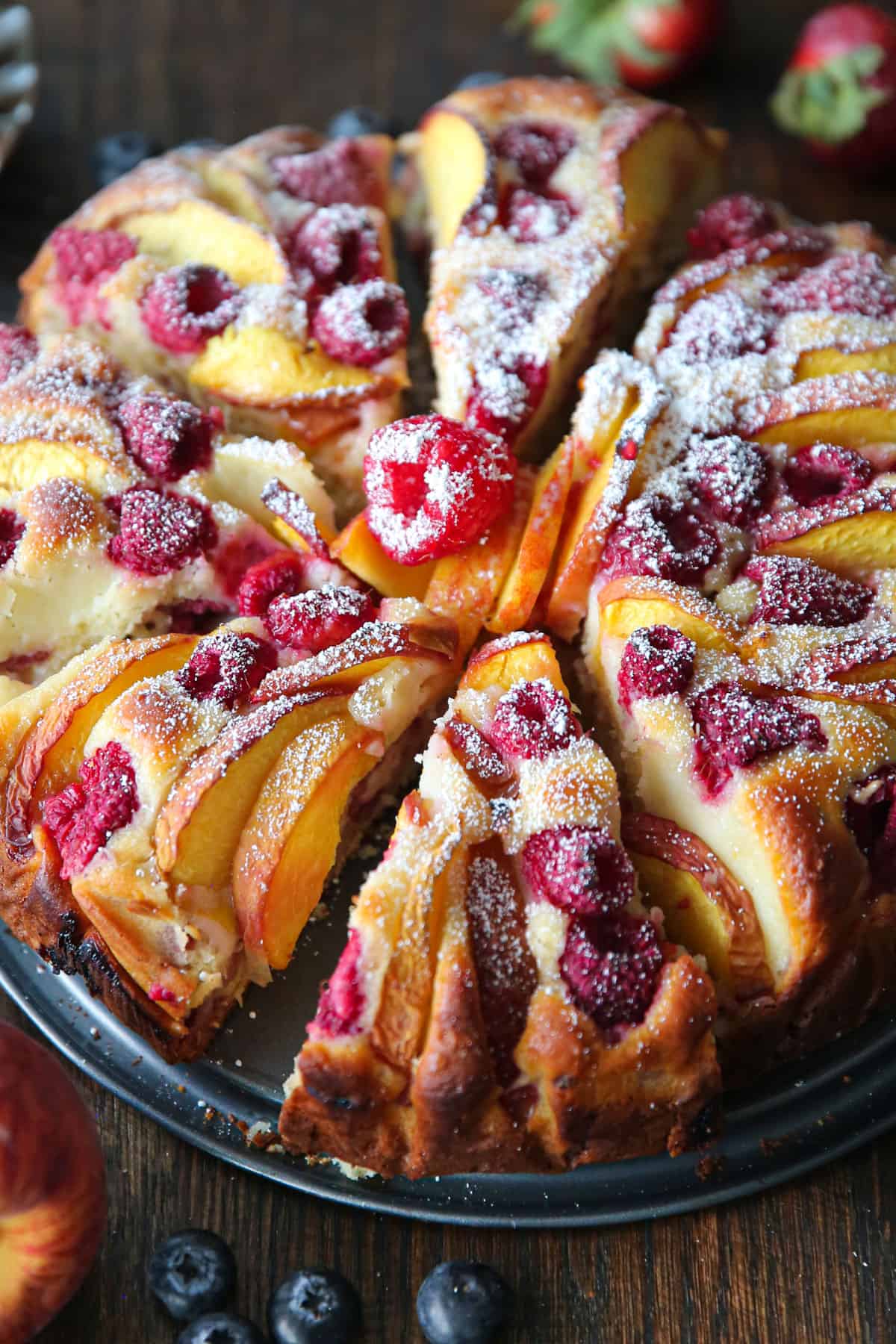 raspberry peach cake (sliced and topped with powdered sugar).