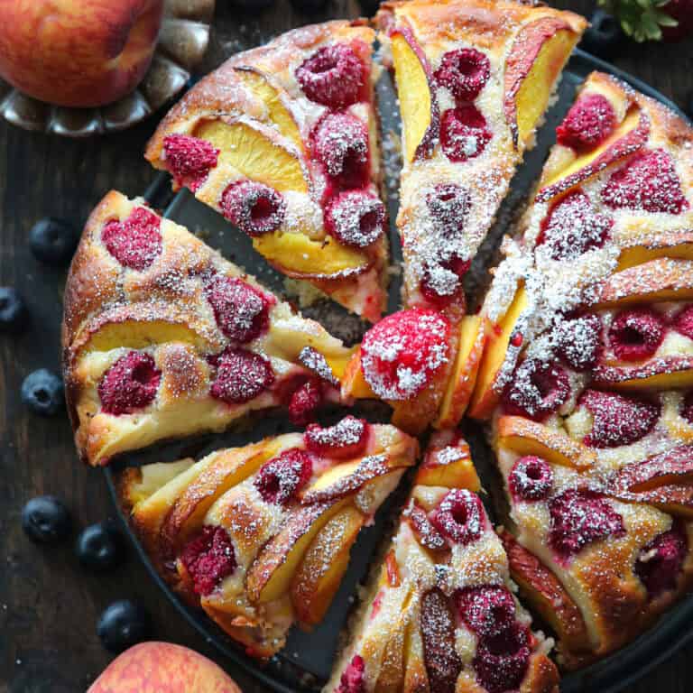 raspberry peach cake (sliced and lightly topped with powdered sugar).