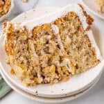 a slice of hummingbird cake on a plate.