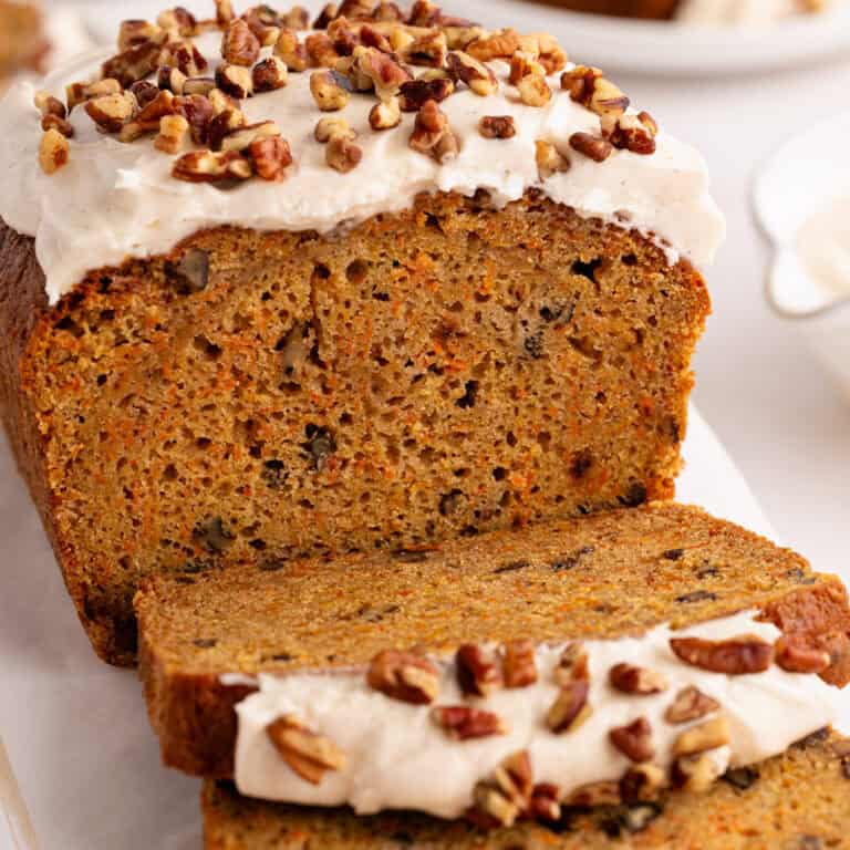 Carrot Cake Loaf with Cream Cheese Frosting and Pecans.