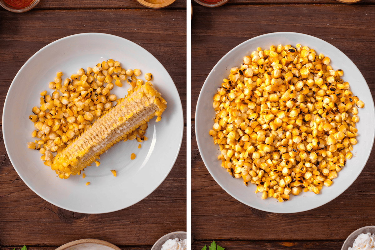 Slicing off corn kernels on a white plate.