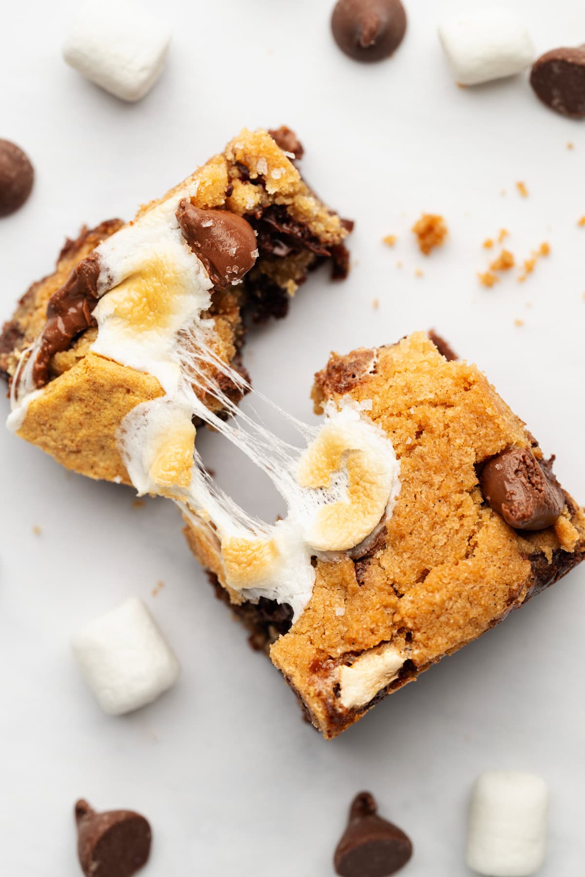 A S’mores Bar pulled apart, with gooey, melted marshmallow stretching from the top.