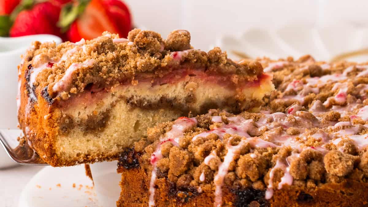 Strawberry Coffee Cake with a slice being lifted on a spatula.