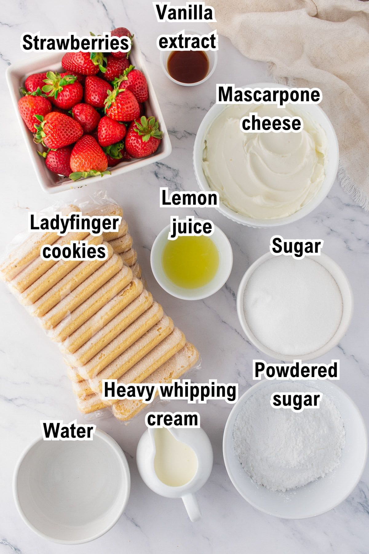 The Ingredients for Strawberry Tiramisu This photo shows all the ingredients needed to make strawberry tiramisu (with labels).