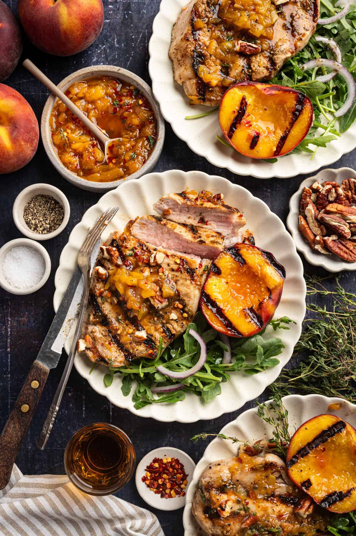 Pork Chops with Peaches and Bourbon Glaze Grilled Pork Chops with Grilled Peaches and Bourbon Glaze (on 3 small plates)