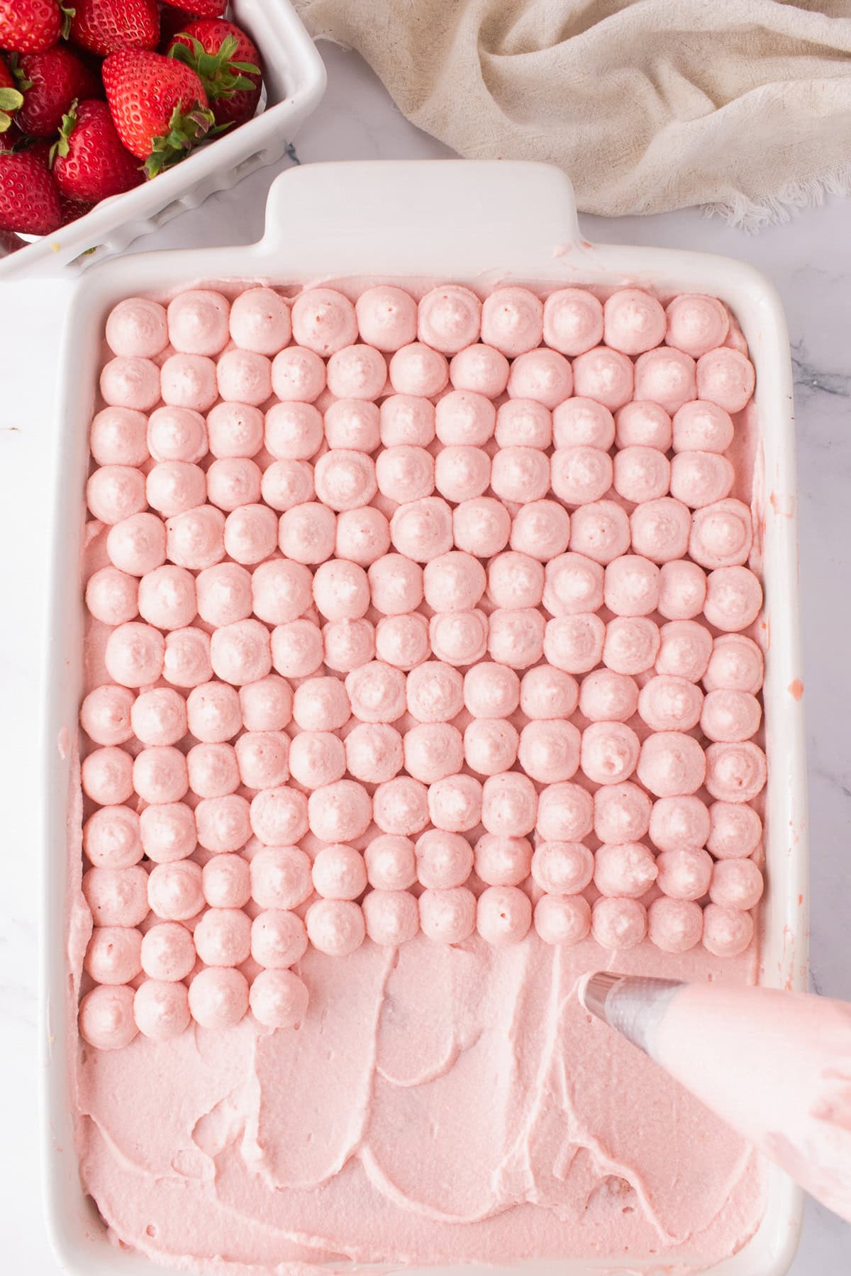 Strawberry Tiramisu Strawberry Tiramisu in a white baking dish.
