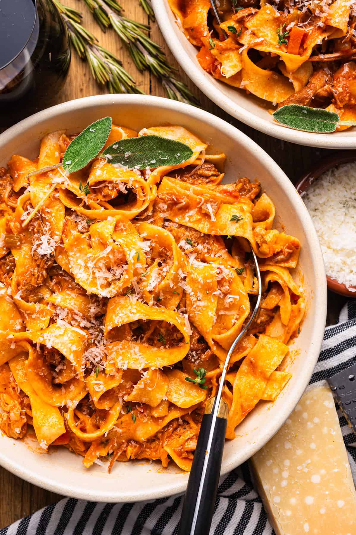 Braised Pork Ragu Pappardelle in a white bowl.