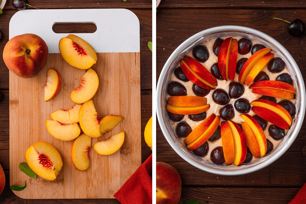 How to Make Cherry Peach Ricotta Cake (Step-by-Step Photos) Sliced peaches on a cutting board next to a round cake pan filled with batter, topped with sliced peaches and whole cherries, set on a wooden surface.