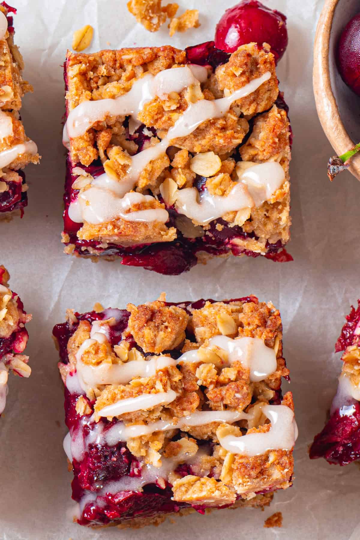 Cherry Pie Bars Cherry Pie Bars with Oat Crust drizzled with Lemon Glaze.