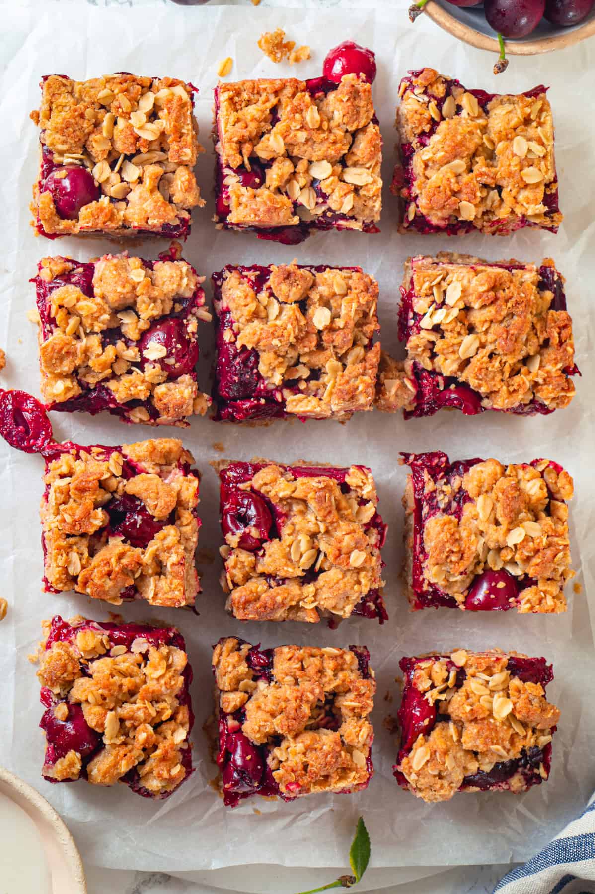 Cherry Pie Bars Cherry Pie Bars with Oat Crust drizzled with Lemon Glaze.