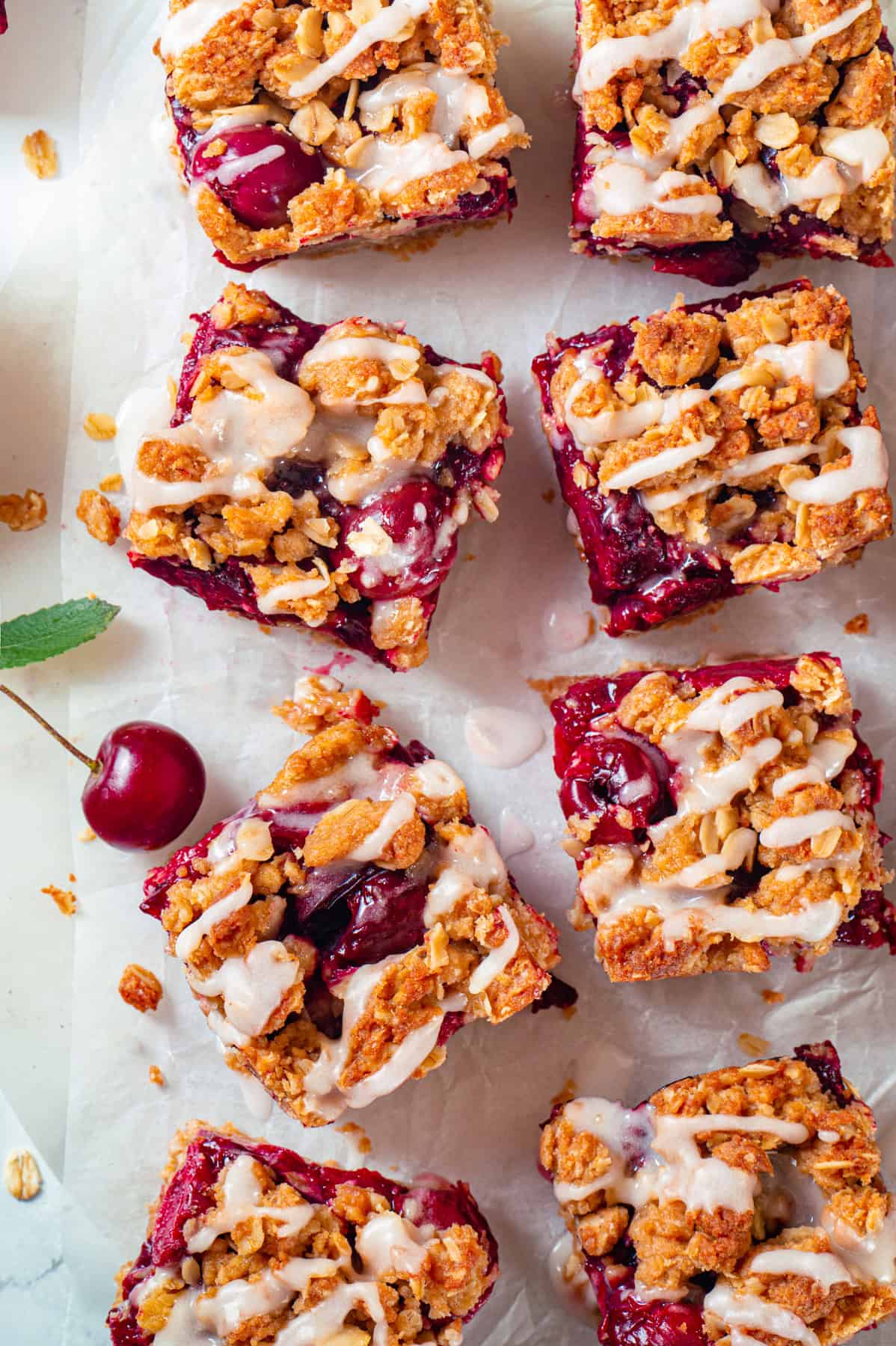 Cherry Pie Bars Cherry Pie Bars with Oat Crust drizzled with Lemon Glaze.