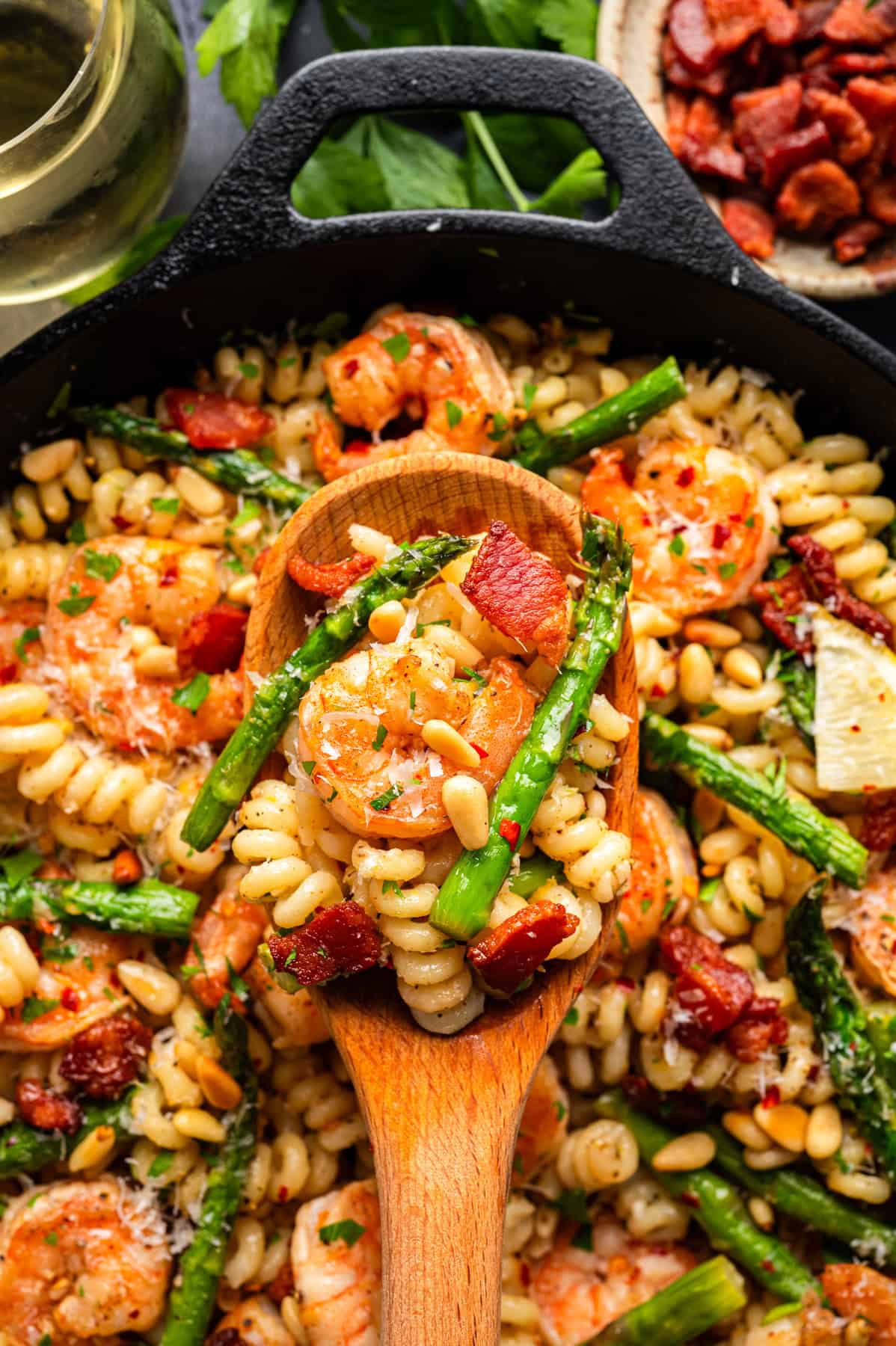 Shrimp Asparagus Pasta with Bacon, Parmesan, and Pine Nuts Shrimp Asparagus Pasta with Bacon, Parmesan, and Pine Nuts - in a cast iron skillet.