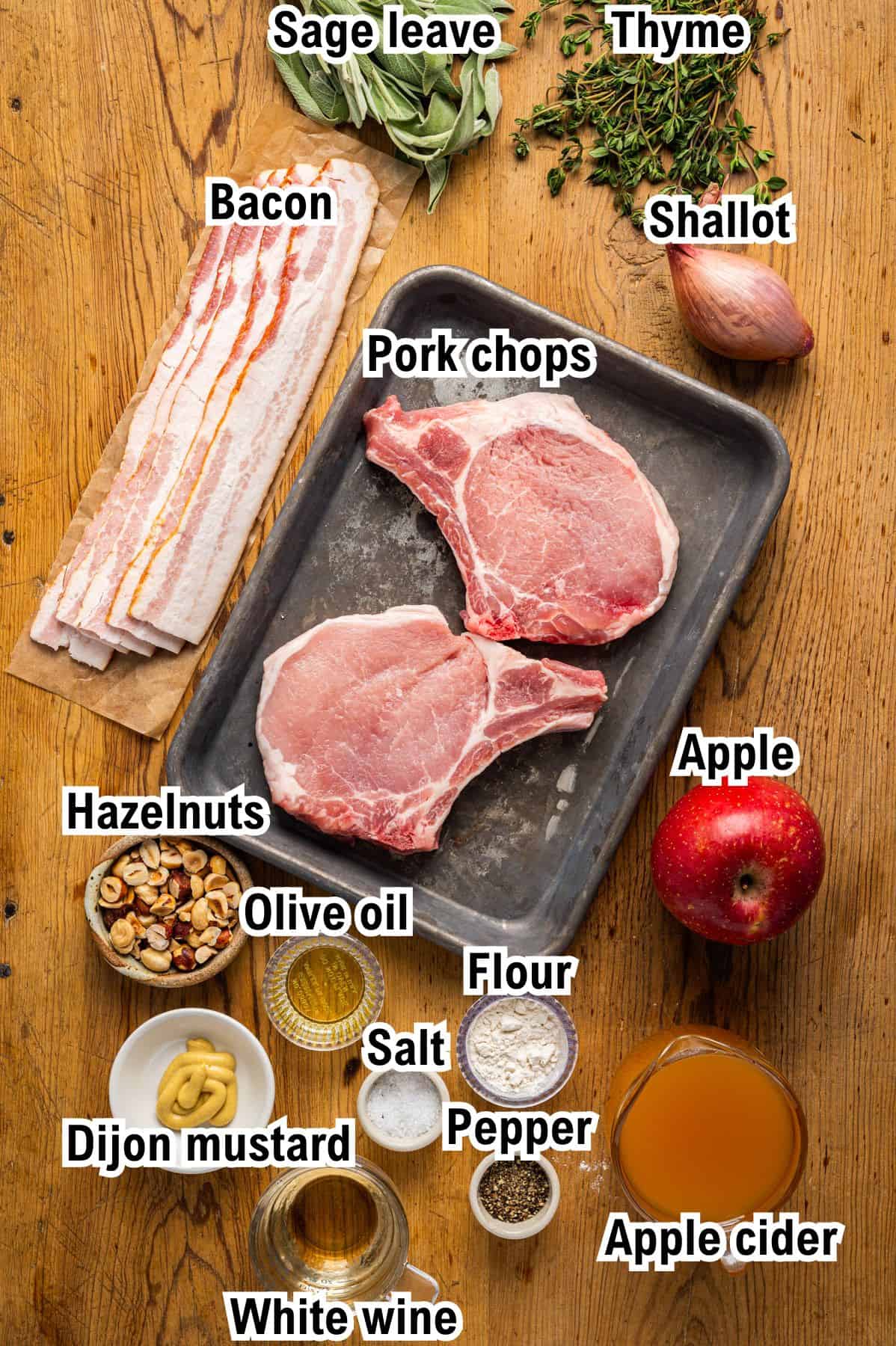The Ingredients for Apple Cider Pork Chops with Apples and Bacon This photo shows all the ingredients (labeled) for Apple Cider Pork Chops with Apples and Bacon.