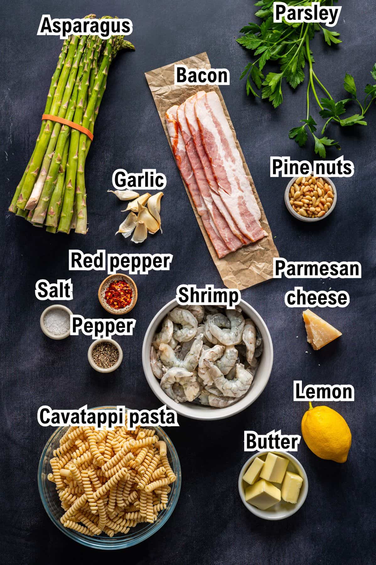 The Ingredients for Shrimp Asparagus Pasta This photo shows all the ingredients (labeled) for Shrimp Asparagus Pasta with Bacon, Parmesan, and Pine Nuts.