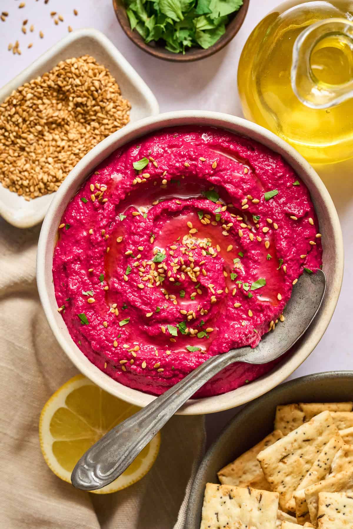 Beet Hummus in a white bowl.