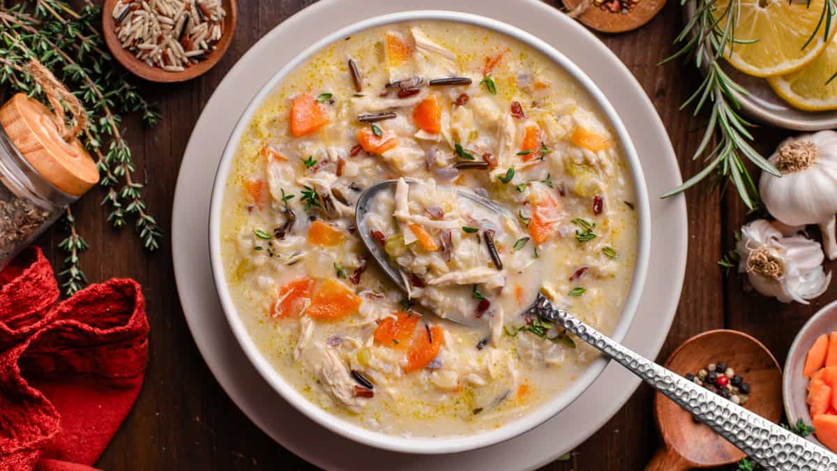 Creamy Chicken & Wild Rice Soup with Carrots in a bowl.