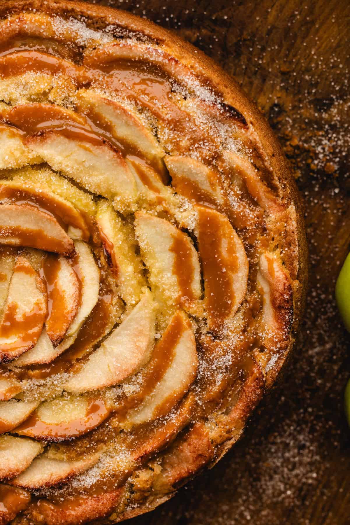 German Apple Cake drizzled with caramel sauce.