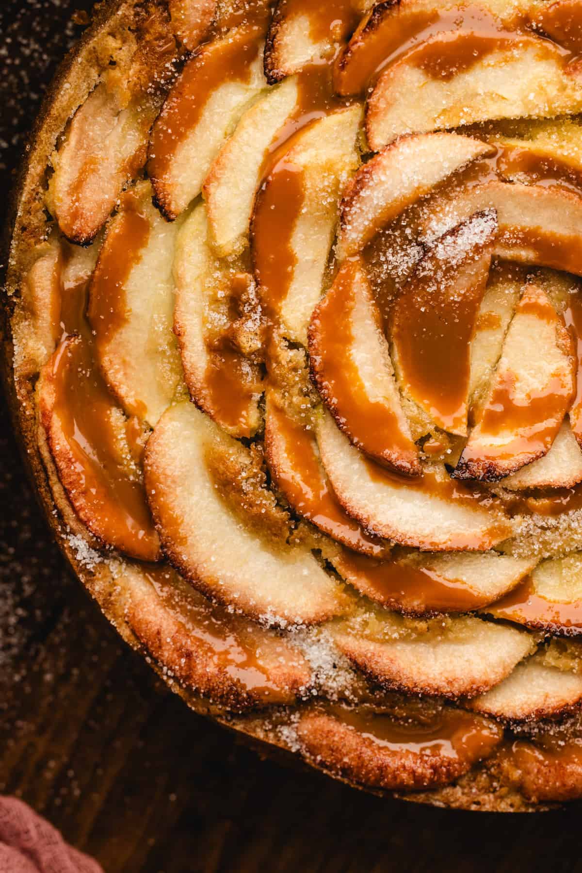 German Apple Cake drizzled with caramel sauce.
